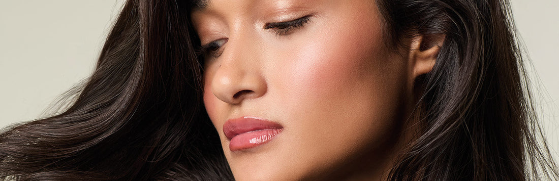 image of a woman with long, brunette hair