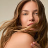 image of a woman with flowing wavy hair