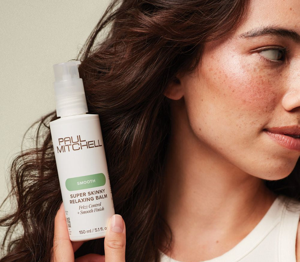 <strong>Frizz Control + </strong><em>Smooth Finish</em>