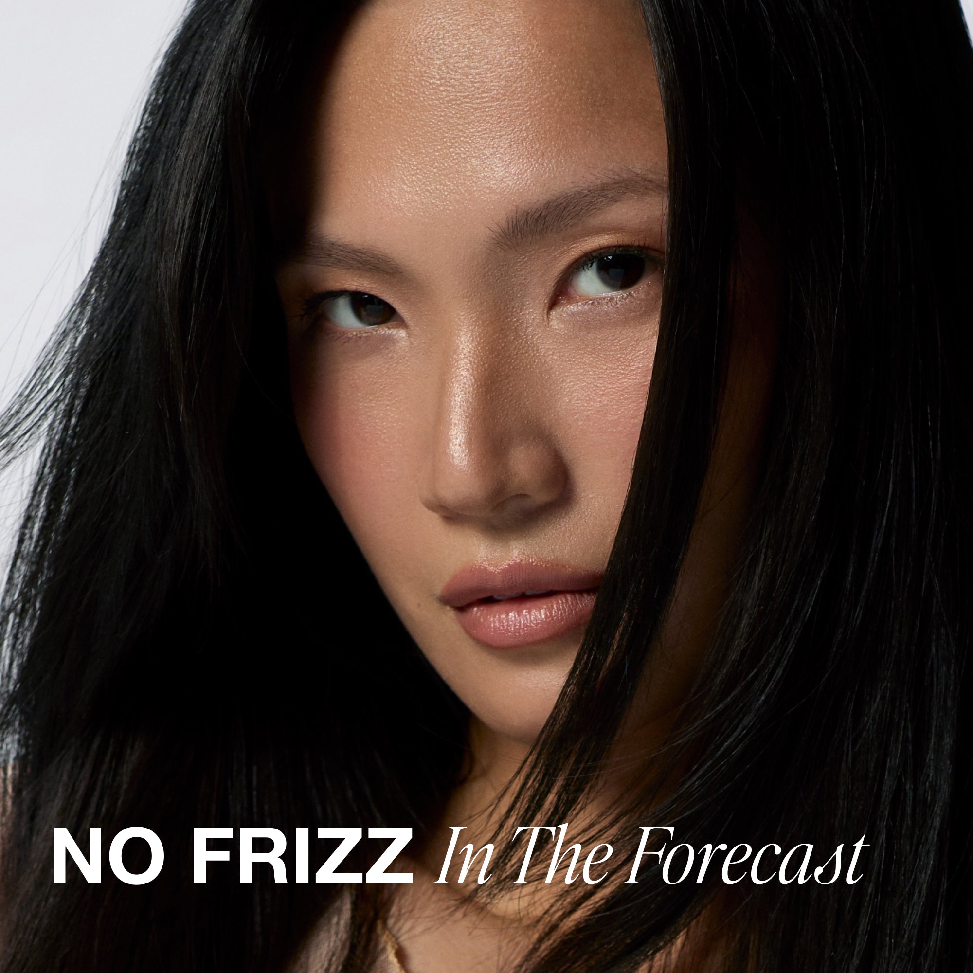 Model with smooth, frizz-free hair after using Paul Mitchell 3-Day No Frizz Spray.