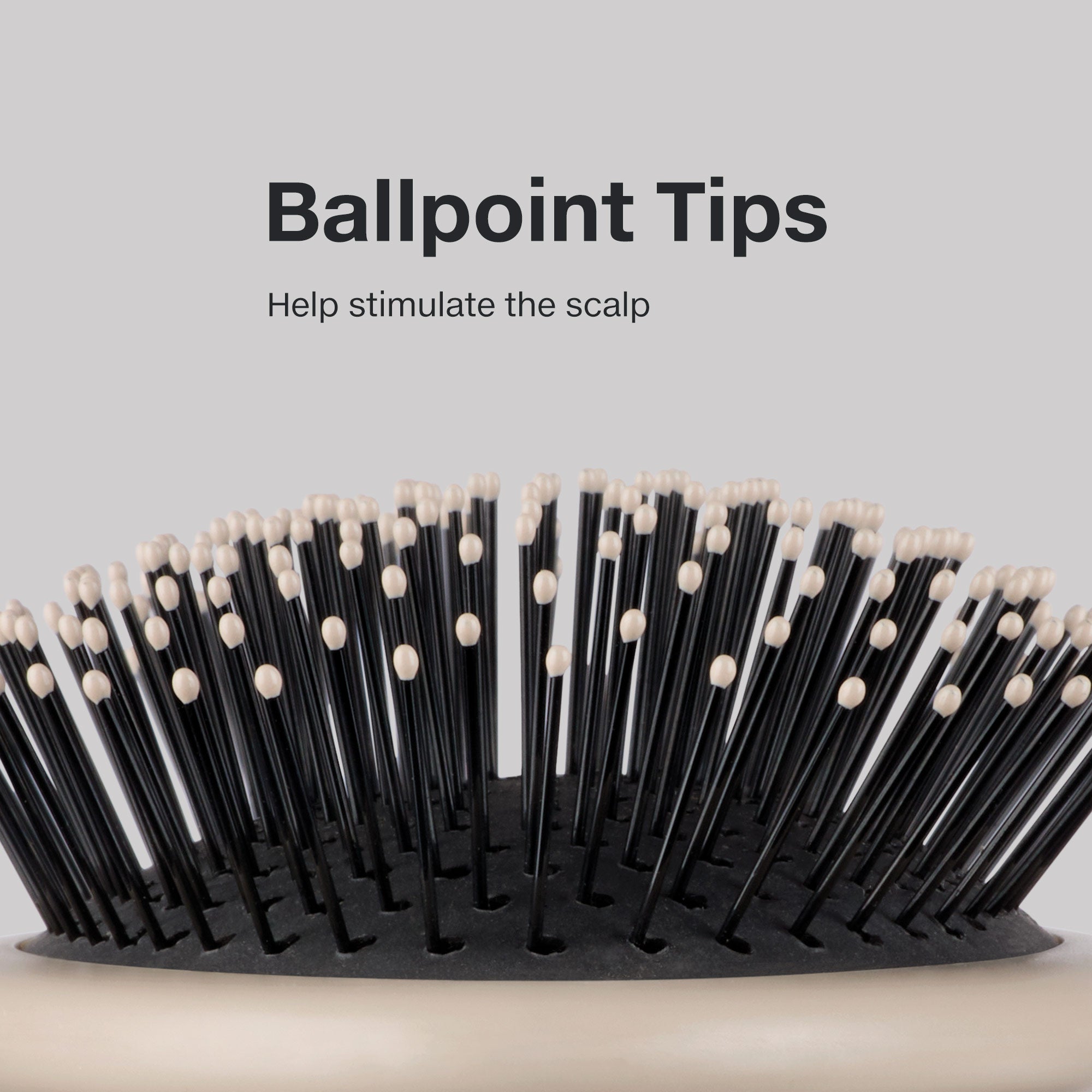 The Detangling Brush features bristles with ballpoint tips that massage the scalp.