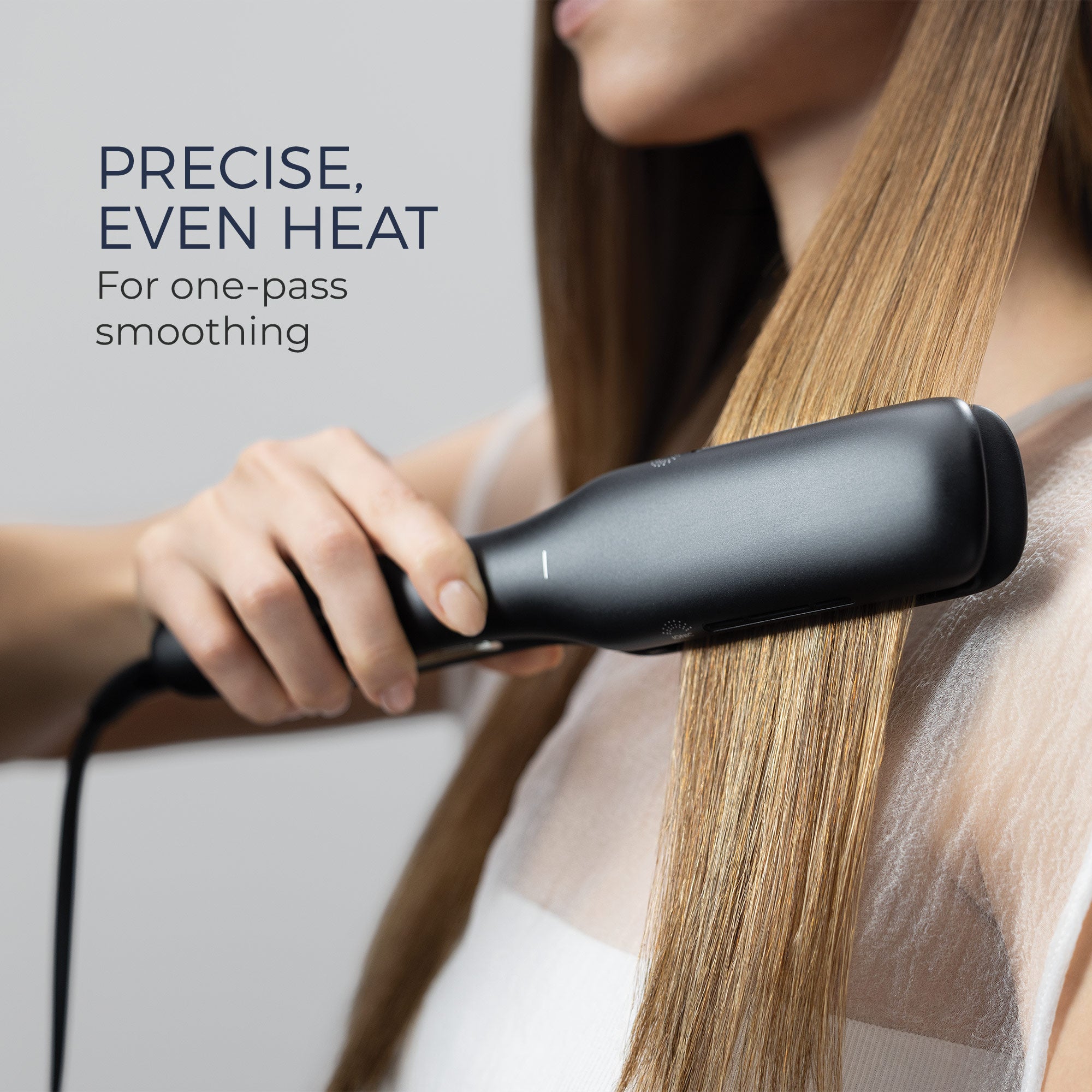 The Neuro Smooth+ 1.75" Ceramic Straightening & Styling Iron provides precise even, heat for one-pass smoothing.