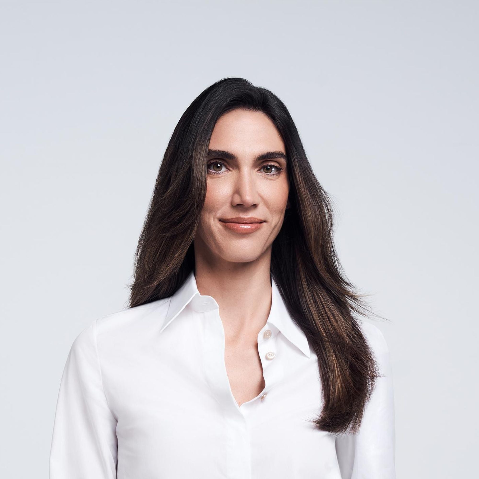 Headshot of our CEO, Michaeline DeJoria, on a neutral background