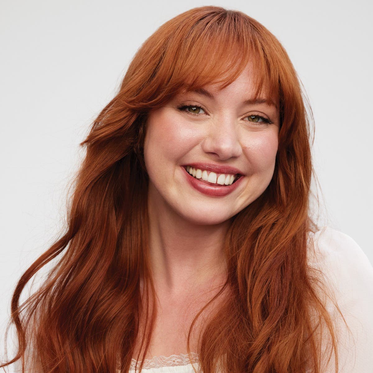 Clean Beauty model with finished look on a neutral background