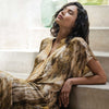 Tea Tree female model with finished look in a lifestyle setting