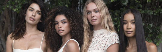 image of female models standing next to one another