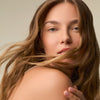 image of a woman with flowing wavy hair
