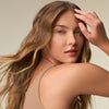 image of a woman with wavy blonde hair