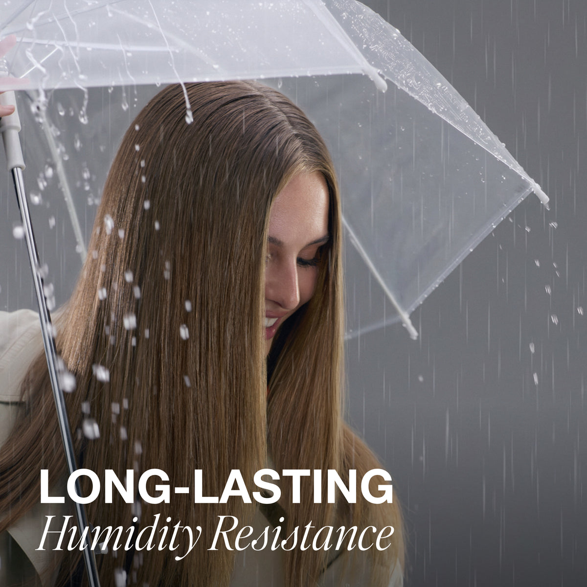 Model in the rain with graphic text: Long-lasting humidity resistance.