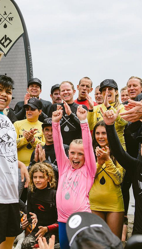 image of kids cheering at A Walk on Water event