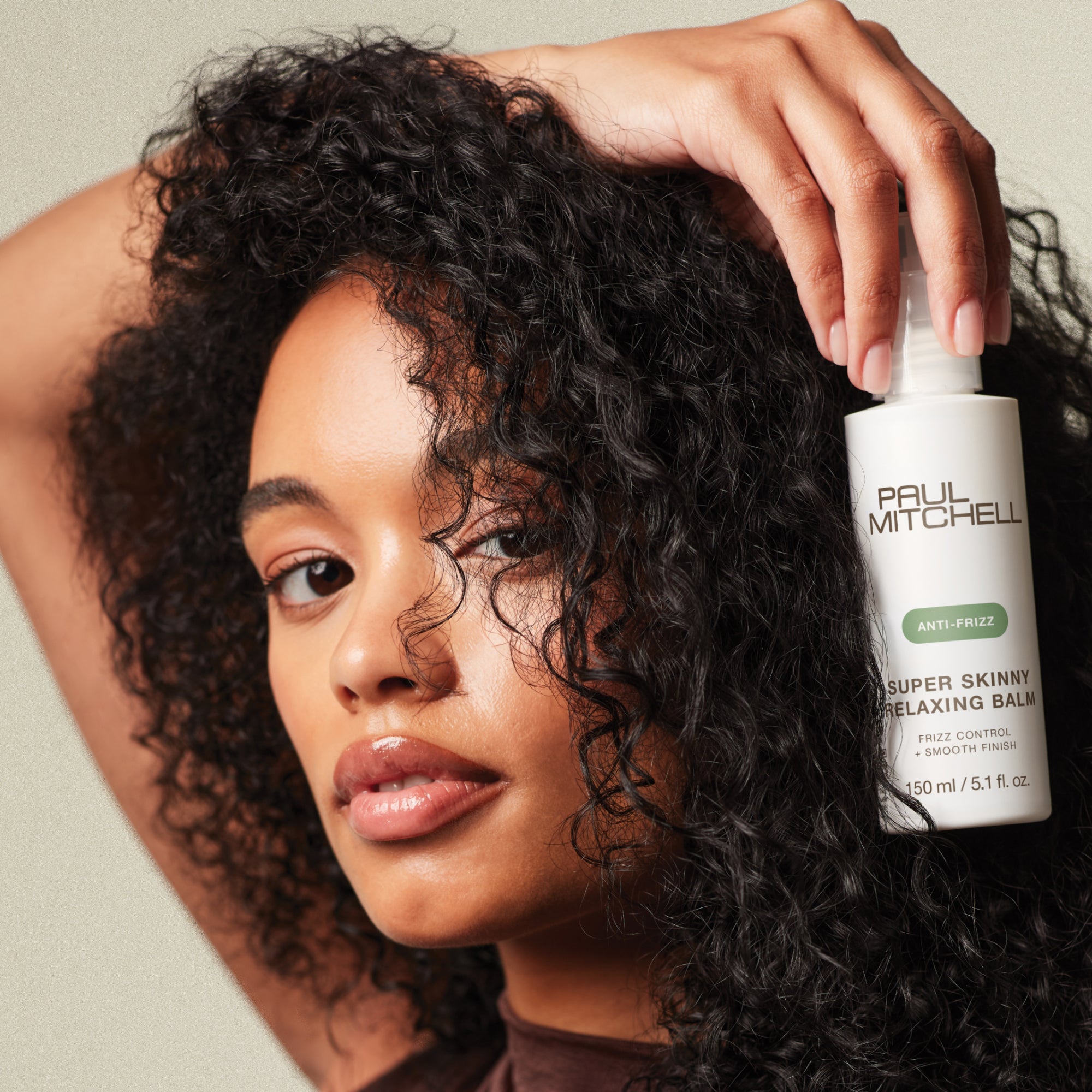 <strong>Frizz Control + </strong><em>Smooth Finish</em>