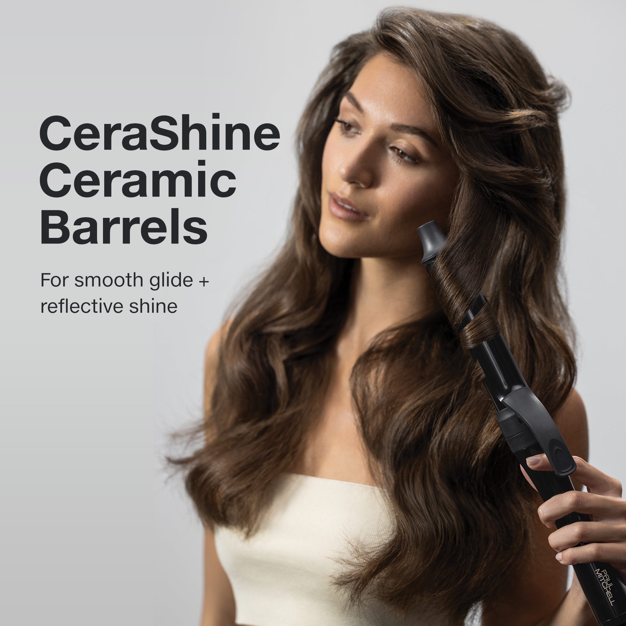 The Paul Mitchell Clipped 3-in-1 Interchangeable Curling Iron features CeraShine ceramic barrels for smooth glide.
