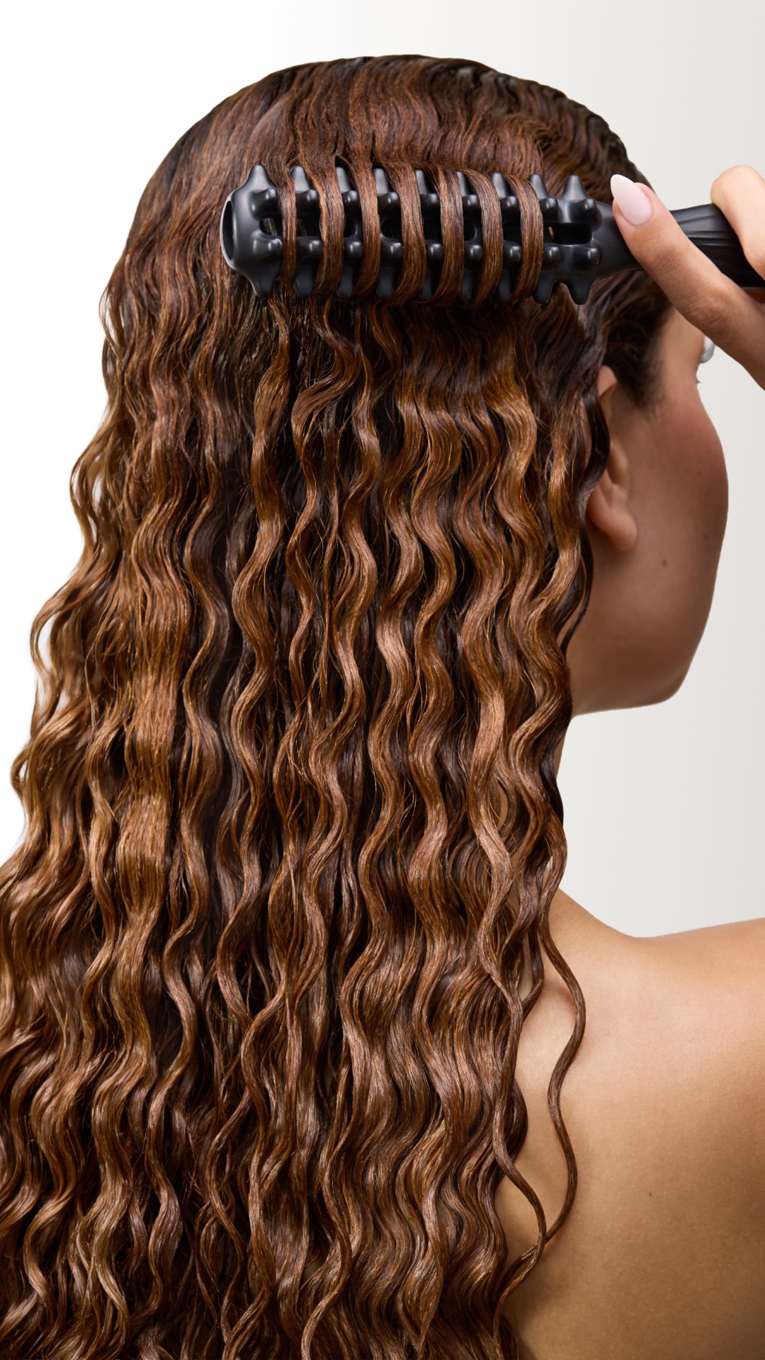 Model using Paul Mitchell Curl Brush