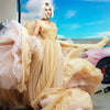 image of Paris Hilton multitasking like a queen look at the gas station