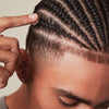 Men’s cornrows braided hairstyle styled with MITCH High Hold Pomade.