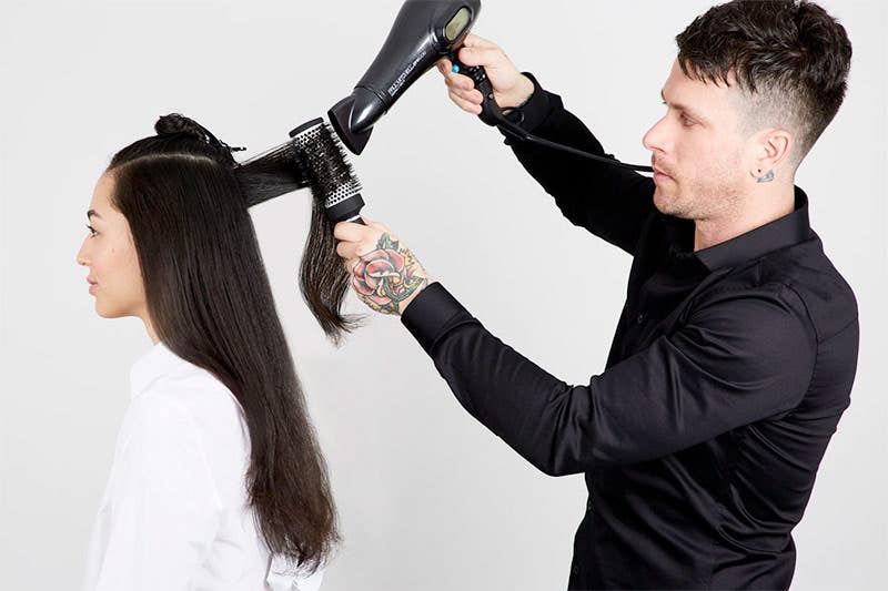 How To: Bouncy Half-Up Pony Step 4 of 14. Blow dry with a round brush.