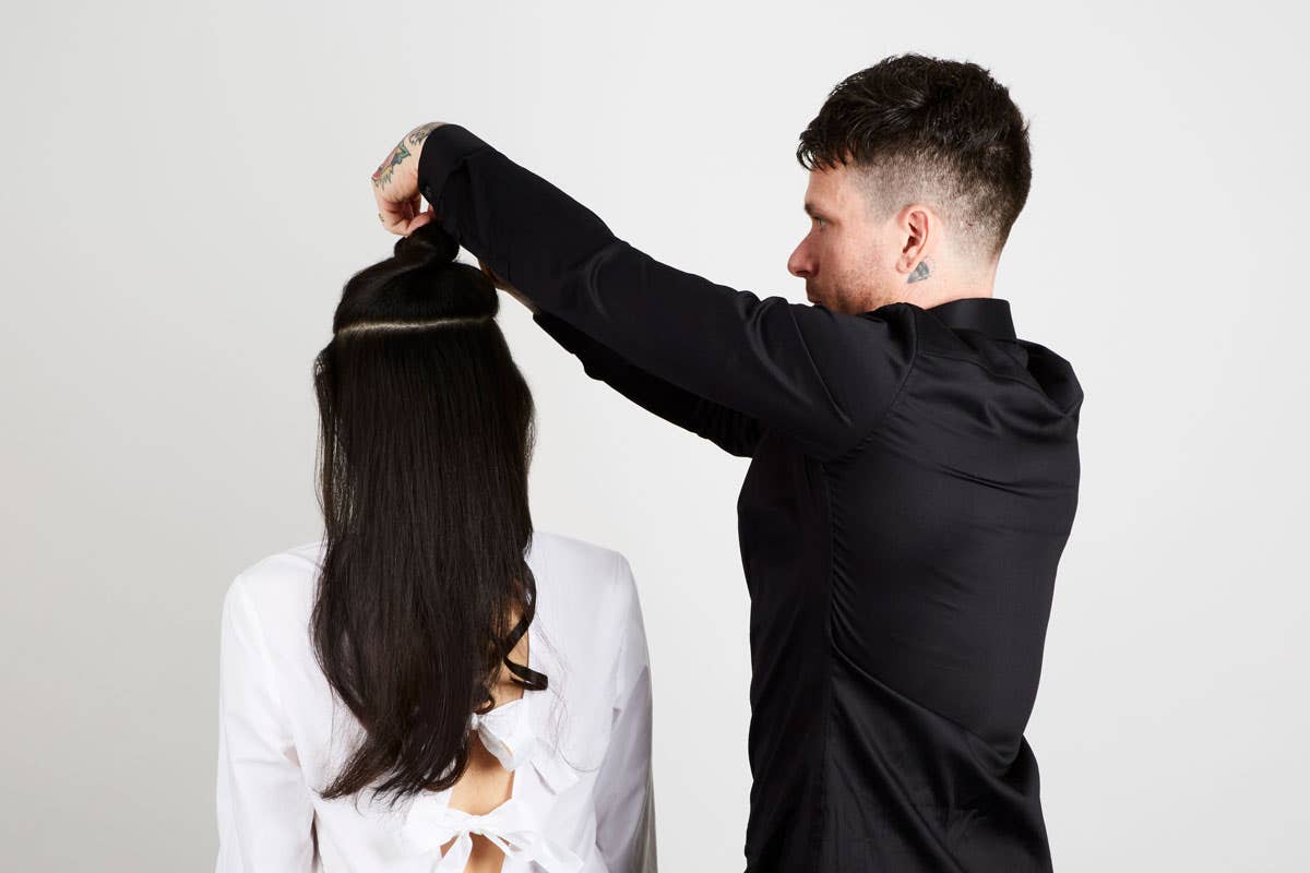 How To: Bouncy Half-Up Pony Step 8 of 14. From top of head, use Express Ion Gold Curling Iron to curl hair. 