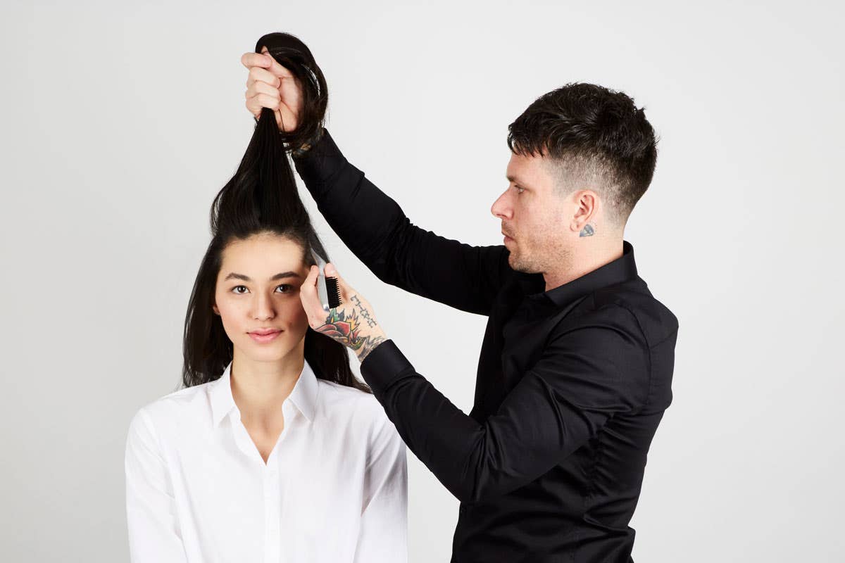 How To: Bouncy Half-Up Pony Step 9 of 14. Use comb to section off hair.