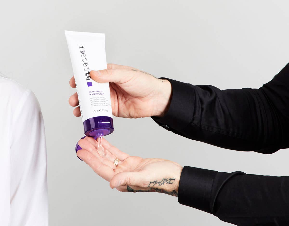 How To: Bouncy Half-Up Pony Step 13 of 14. Use Extra Body Sculpting Gel to hold down flyaways.