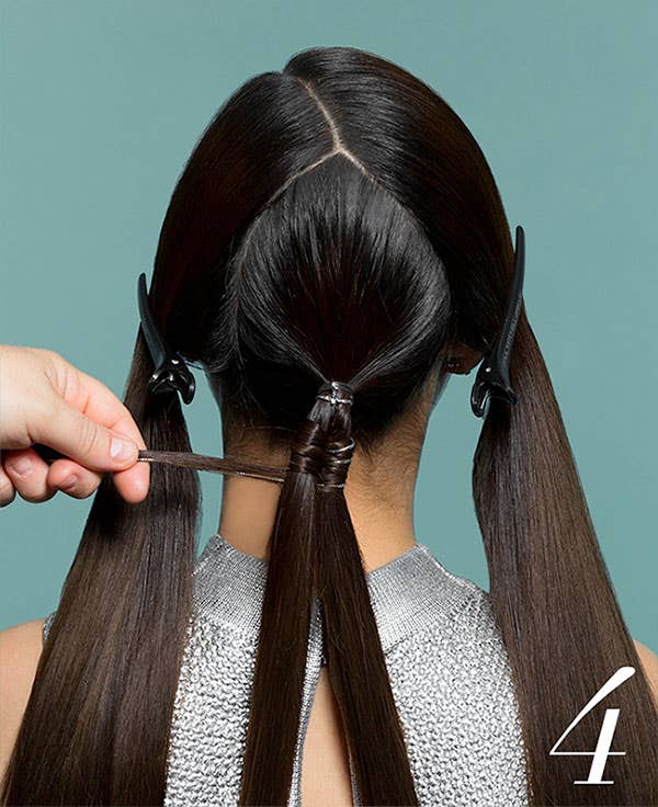 How to Add Flair to Holiday Hair with Awapuhi Wild Ginger Step 4 of 10. Wrapping string within ponytail.