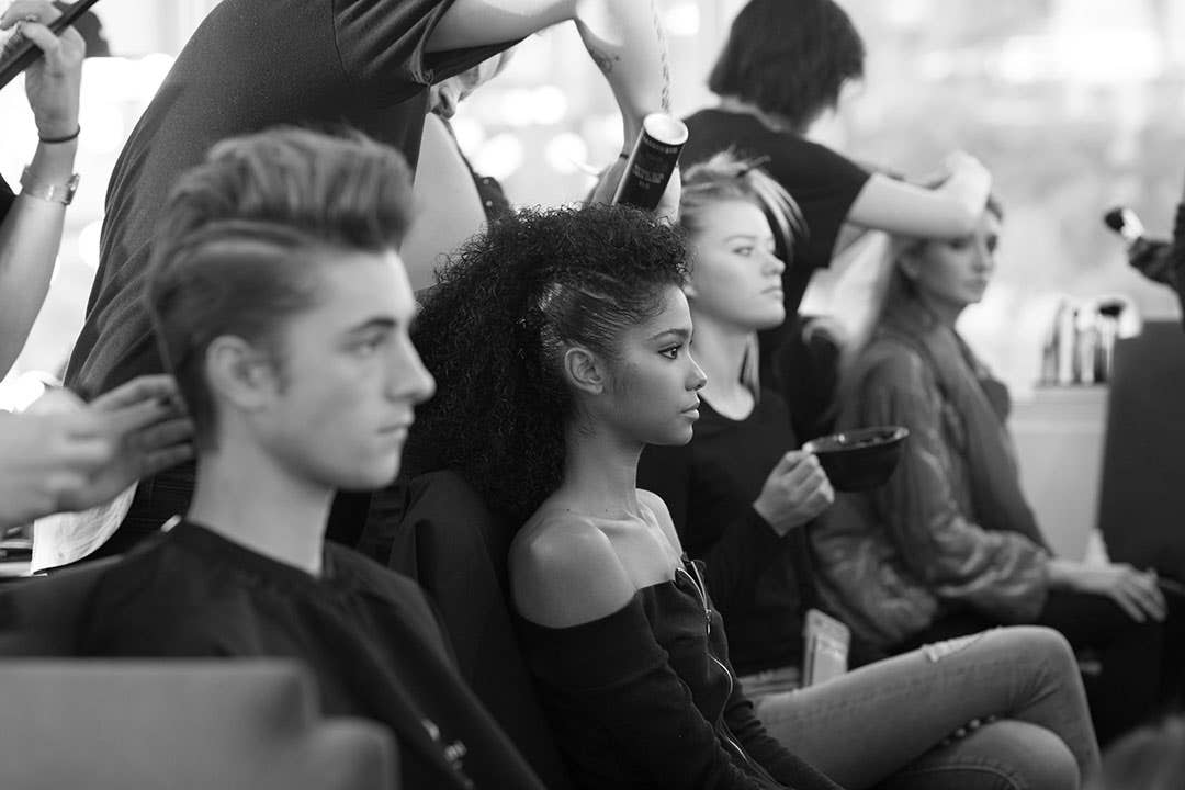 Wolk Morais Collection 6 Fashion Show Behind the Scenes. Models in chairs getting their hair done.