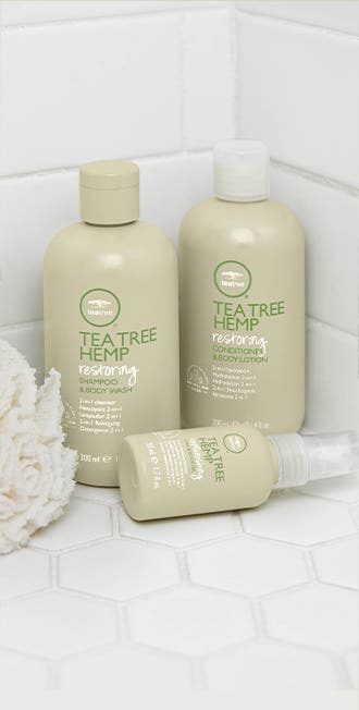 Artistic image of various products from the Tea Tree Hemp collection