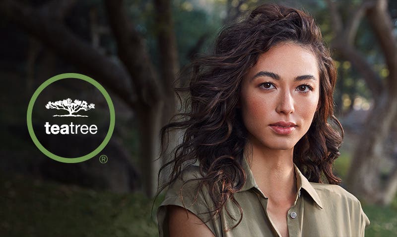 Image of Tea Tree Hemp logo and model with dark brown wavy hair